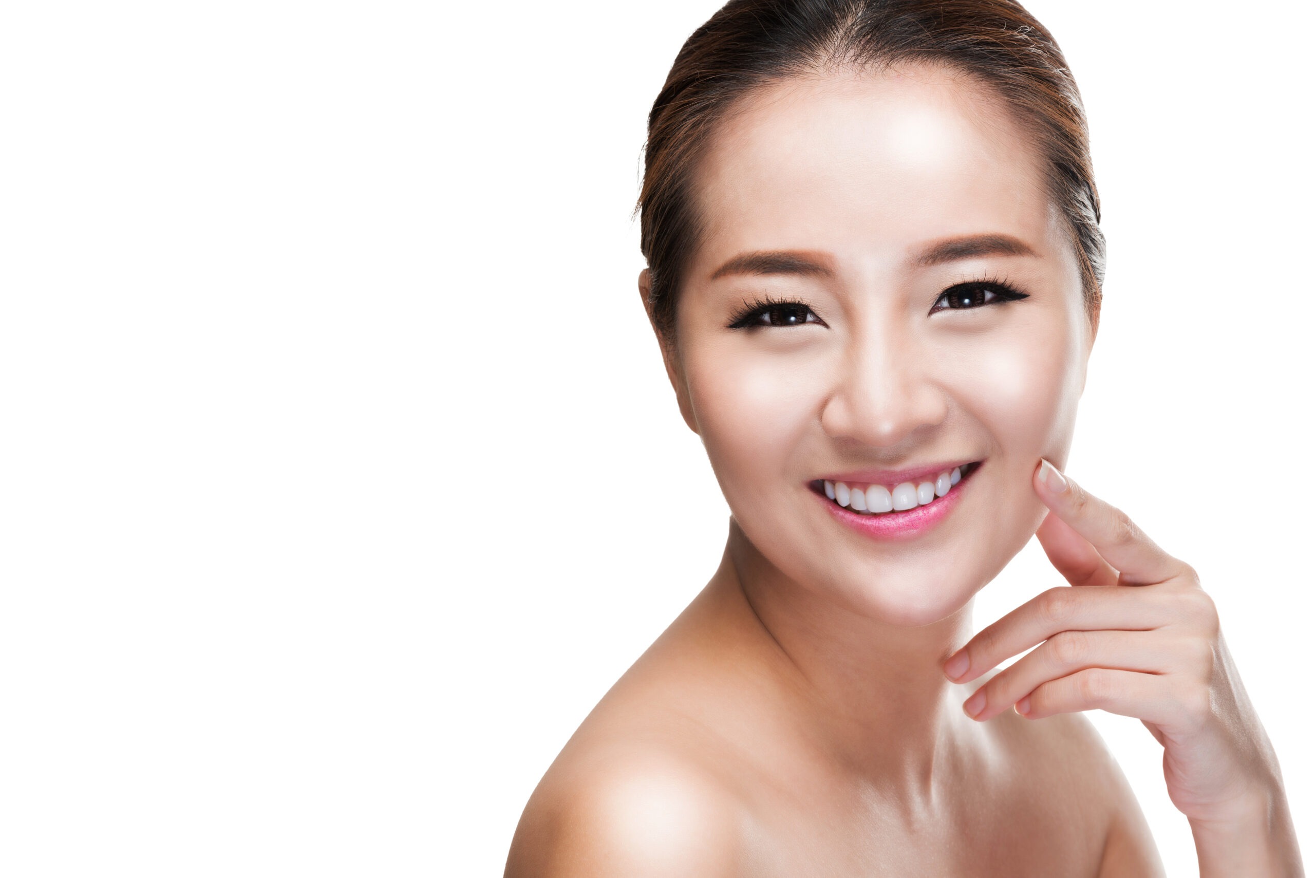 Young woman with a radiant smile and clear skin
